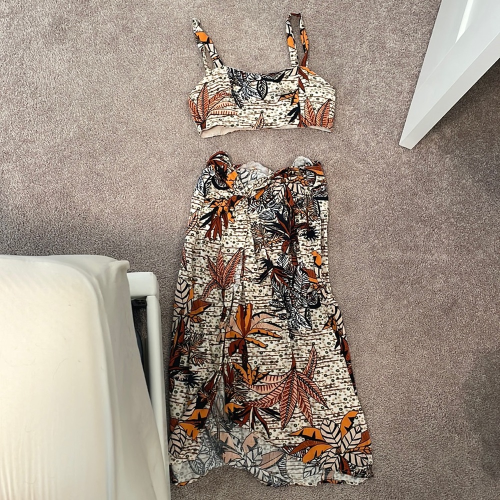 Printed two piece tank top and skirt. Size medium US 6.
